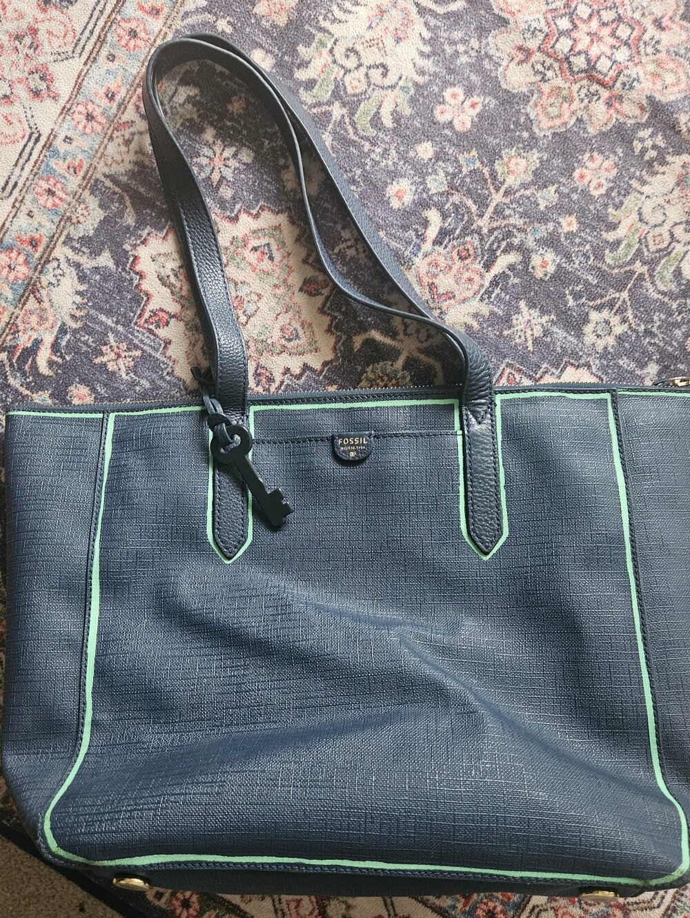 Fossil Sydney Shopper tote bag in navy blue with distinctive light green piping